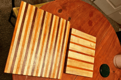 our-work-saw-logs-to-lumber - striped-wooden-cutting-boards